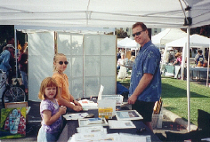 Kids coloring at the Merced Art Festival